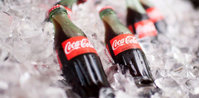 Coca-Cola bottles in ice